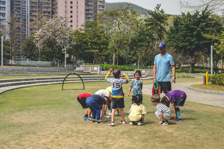 March 12 2023 a Group of children in the parkの写真素材