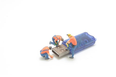 a Computer Hardware Repairs, the figure with flash drive usbの写真素材
