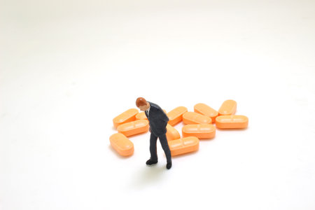 Medical and Information Concept. Businessman addiction to medicationの写真素材