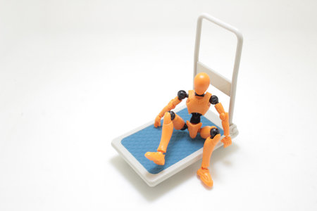 the Figure sit on Warehouse trolley isolatedの写真素材