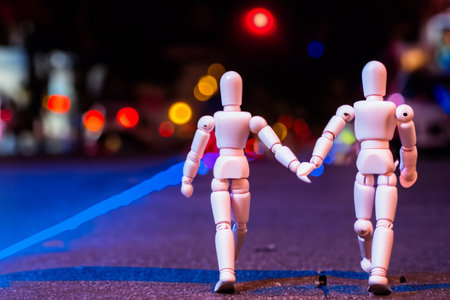 a wood figure walk in the streetの素材