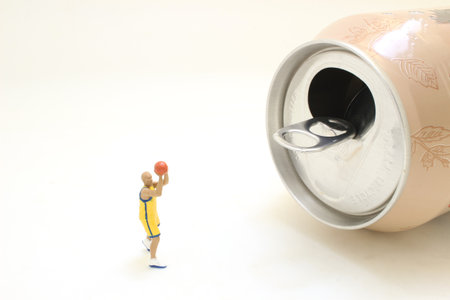 mini figure play the basketball with soda canの写真素材