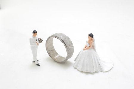 a Miniature people groom and bride on backgroundの写真素材