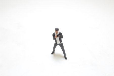 a fun of mini photographer figure are shootingの写真素材