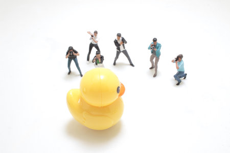 a fun of mini photographer figure are shootingの写真素材