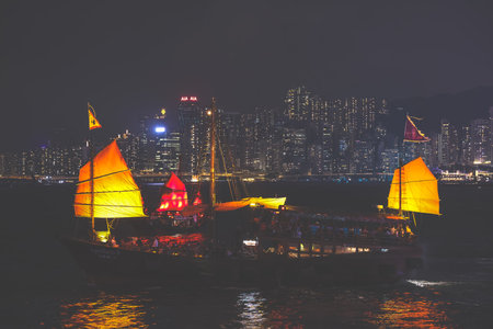 Victoria Harbour Hong Kong night view with junk ship Oct 17 2024