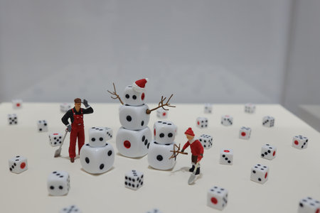 Miniature Workers Building a Dice Snowman in Winter Wonderland Nov 22 2024