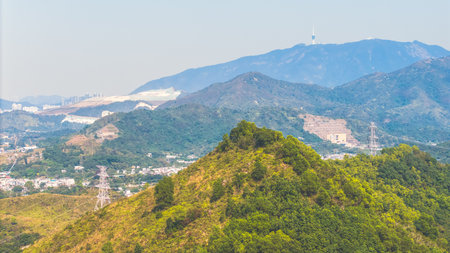 Valley Landscape With Green Forests and Urban Sceneryの写真素材
