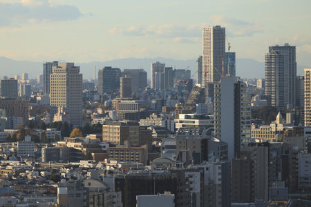 Dec 6 2024 showcasing an expansive urban environment with modern skyscraperの写真素材