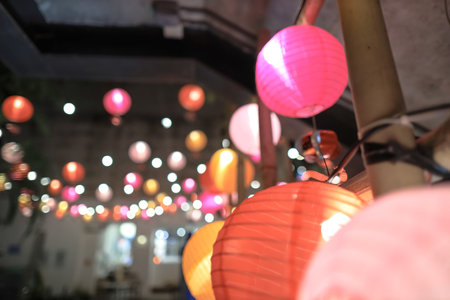 Feb 10 2025 A vibrant display of pink and colorful paper lanternsの写真素材
