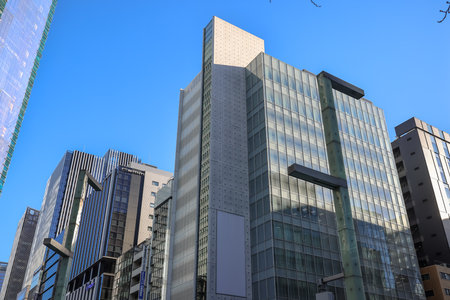 Dec 10 2024 Contemporary office buildings with distinctive designs stand tall,の写真素材