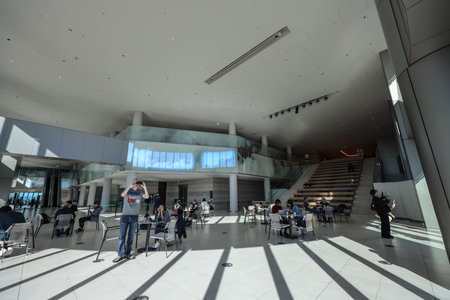 Dec 9 2024 Bright and modern interior of a building lobby with large glass elementsの写真素材