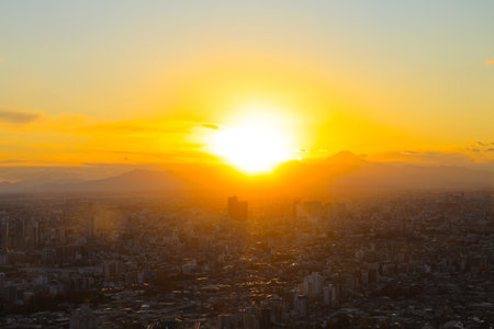 Dec 6 2024 sprawling city with buildings against a backdrop of mountains.の写真素材