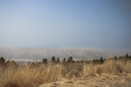 Expansive view of countryside fields under a vastの写真素材