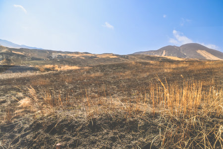 Tranquil outdoor scenery showcasing arid, rugged hills under a clear,の写真素材