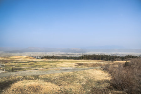 Expansive view of countryside fields under a vastの写真素材