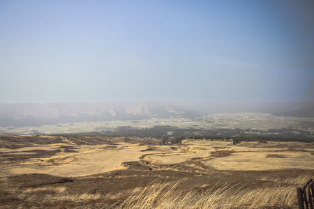 Expansive view of countryside fields under a vastの写真素材