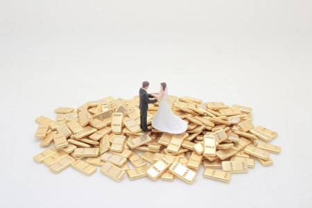 Symbolizing wealth and prosperity, a miniature couple standsの写真素材