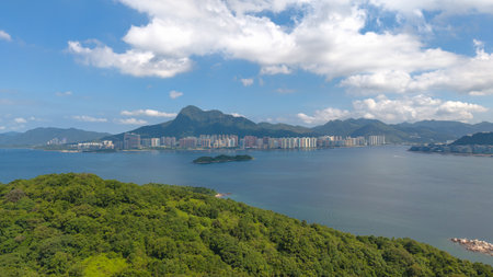 breathtaking aerial view of a lush green forested islandの写真素材
