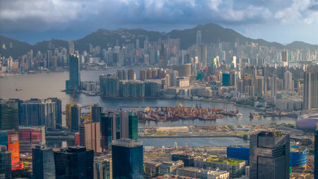 Urban skyline showcasing tall skyscrapers and sprawling urban areasの写真素材