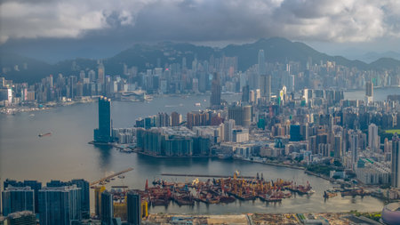 Urban skyline showcasing tall skyscrapers and sprawling urban areasの写真素材