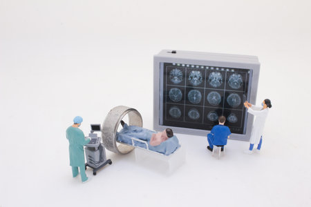 Depicts intricate miniature figures of medical professionals using MRIの写真素材