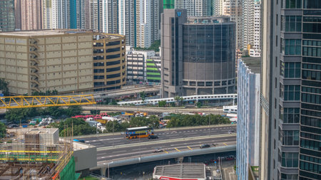 Dynamic city landscape with towering glass skyscrapers and urban skylineの写真素材