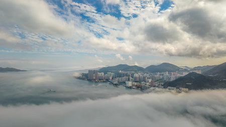 March 2 2025 aerial perspective capturing a city by the sea, surroundedの写真素材