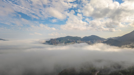 March 2 2025 skyline nestled amidst towering mountains with clouds