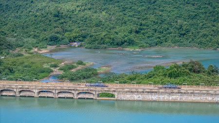 Historic dam road with nature and water views