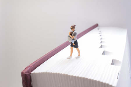 A captivating scene of detailed miniature figures, featuring a parent with a babの写真素材