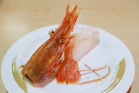 Delicious nigiri sushi featuring sweet shrimp adorned