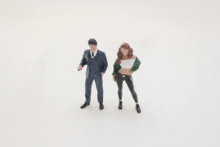 scale duo of figurines, a man and a casually dressed womanの写真素材