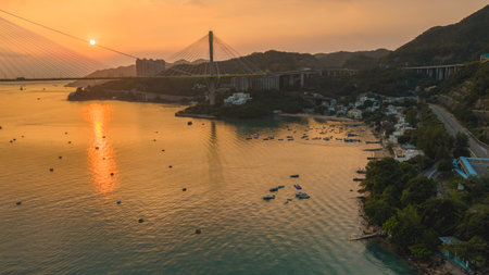 Sunlit Ting Kau Bridge and surrounding scenic viewsの写真素材