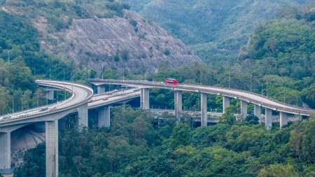 Modern expressway, bridges, traffic, and coastal urban landscapeの写真素材