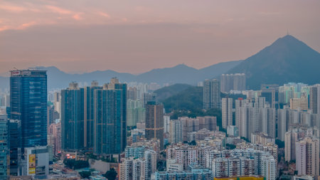 Hong Kong cityscape at twilight with glowing lightsの写真素材