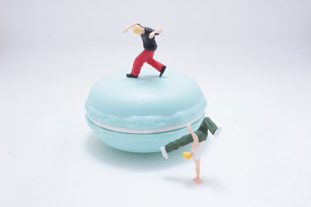 A whimsical scene featuring a light blue macaron