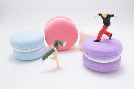 A whimsical scene featuring a light blue macaron