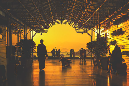 amber toned interior shows visitors seated along a corridor, Tsim Sha Tsui Nov 16 2025のeditorial素材