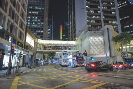Long exposure tramlines, neon signage, urban motion blur