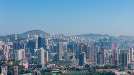 Dense skyline of highrise buildings under vibrant city lights Dec 17 2025のeditorial素材