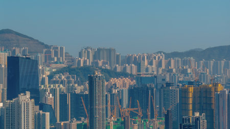 Dense skyline of highrise buildings under vibrant city lights Dec 17 2025のeditorial素材