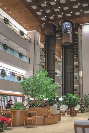 Spacious mall lobby featuring luxury interiors and ambient lightingのeditorial素材