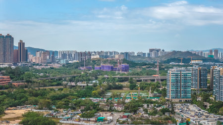 housing estate contrasting with countryside farmland scenery Dec 20 2025