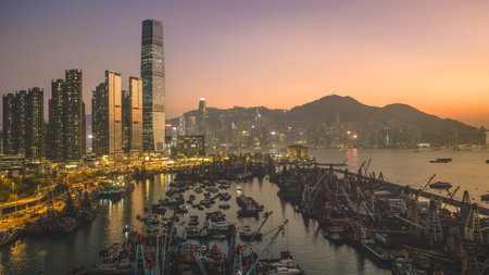 Scenic sunset over Victoria Harbor from Yau Ma Tei Pier Dec 24 2025のeditorial素材
