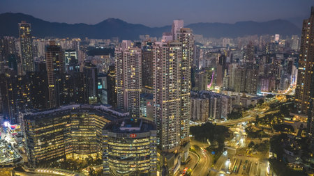 Illuminated cityscape of Yau Tsim Mong district at night Dec 24 2025のeditorial素材