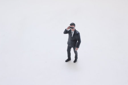 Confident bodyguard stands alert in protective stanceの写真素材