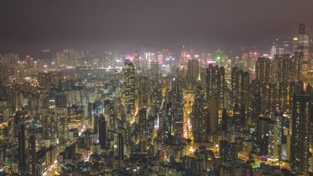 Vibrant city hub featuring neon lights and urban architecture Jan 9 2026のeditorial素材