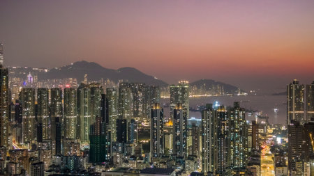 Evening glow highlighting dense residential towers and city lights Jan 9 2026のeditorial素材