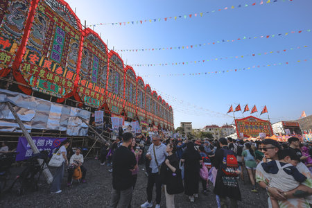 Traditional village festival features lively party atmosphere and rituals Jan 17 2026のeditorial素材